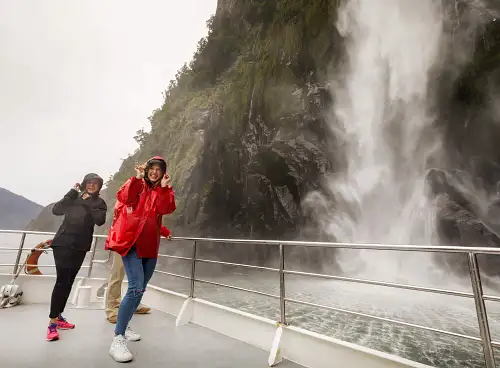 Milford-Sound-Nature-Cruise-cruising-into-the-Stirling-Falls-screen.jpg